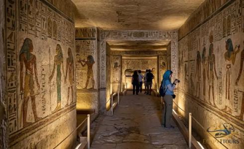 Travelers discovering ancient pharaonic tombs at the Valley of the Kings in Luxor